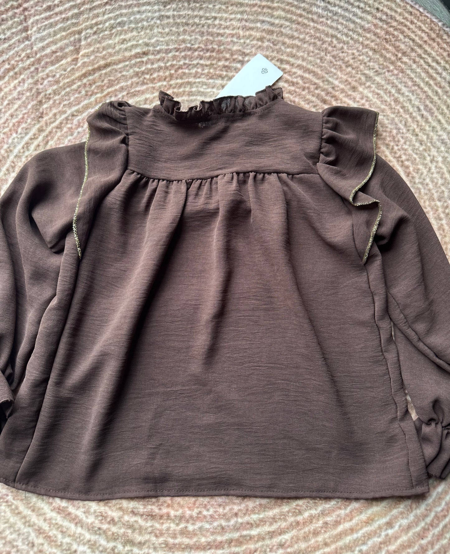 Meisjes blouse met gouden rand en hartjesknoop