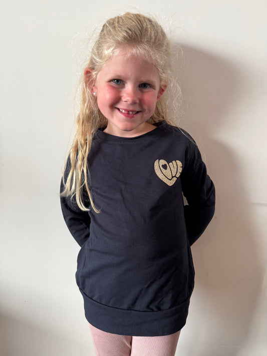 Sweater met glitter design.