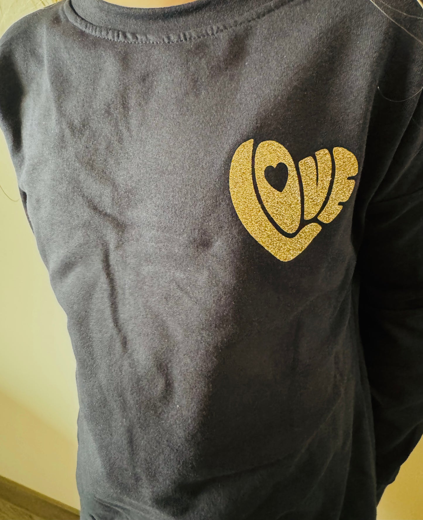 Sweater met glitter design.