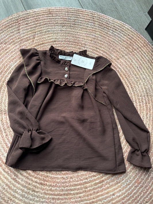 Meisjes blouse met gouden rand en hartjesknoop